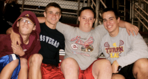 Mitch Stevens with his friends Devin, Stephen, and Adam, who inspired stories in the Transcending Labels Book